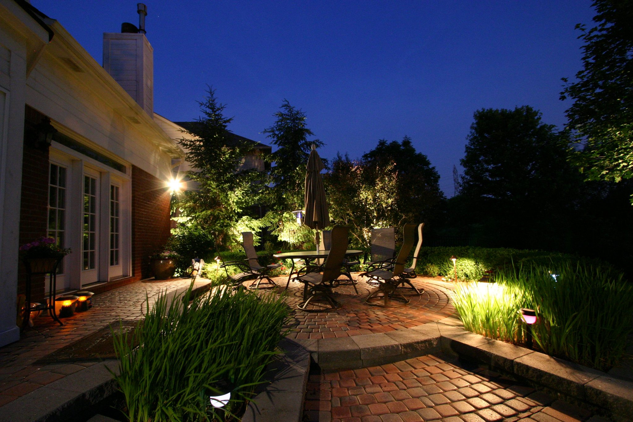 Backyard at Night Luxury Gallery Berns Landscaping Services