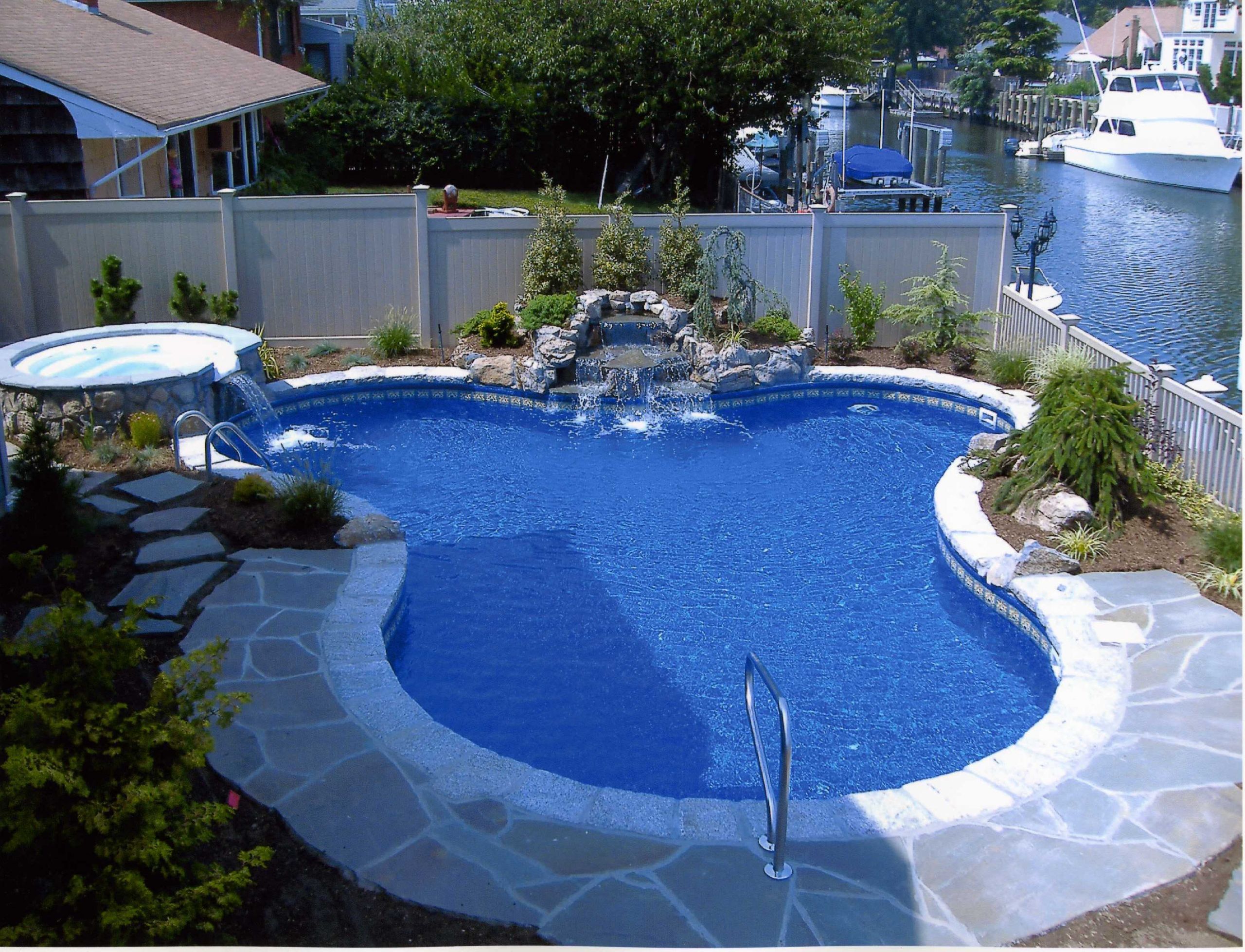 Backyard Swim Pond
 Swimming Pool Design for Your Beautiful Yard – HomesFeed