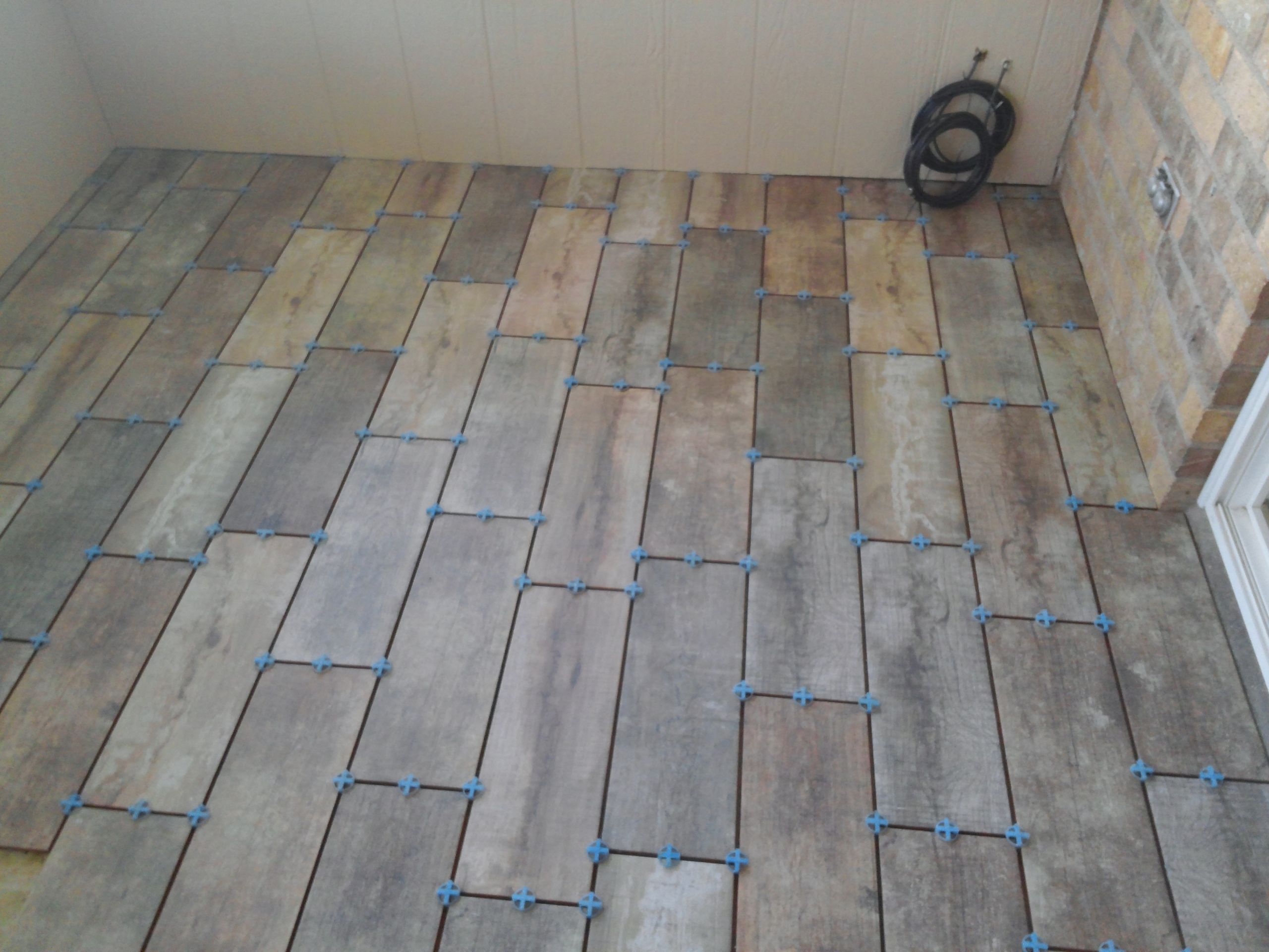 Barnwood Tile Bathroom
 Barnwood tile in sun room Custom Tile Work