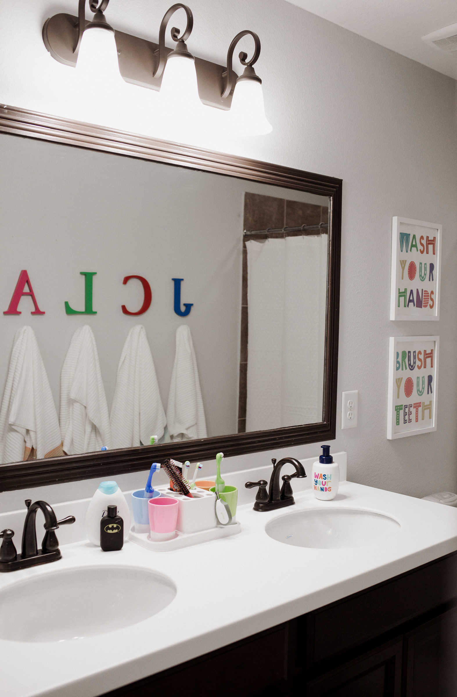 Child Bathroom Decor
 Our Kids d Bathroom Decor Makeover Uptown with Elly