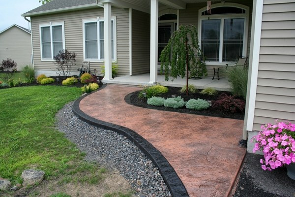 Concrete Patio Landscaping
 Stamped concrete adds depth and beauty to the exterior