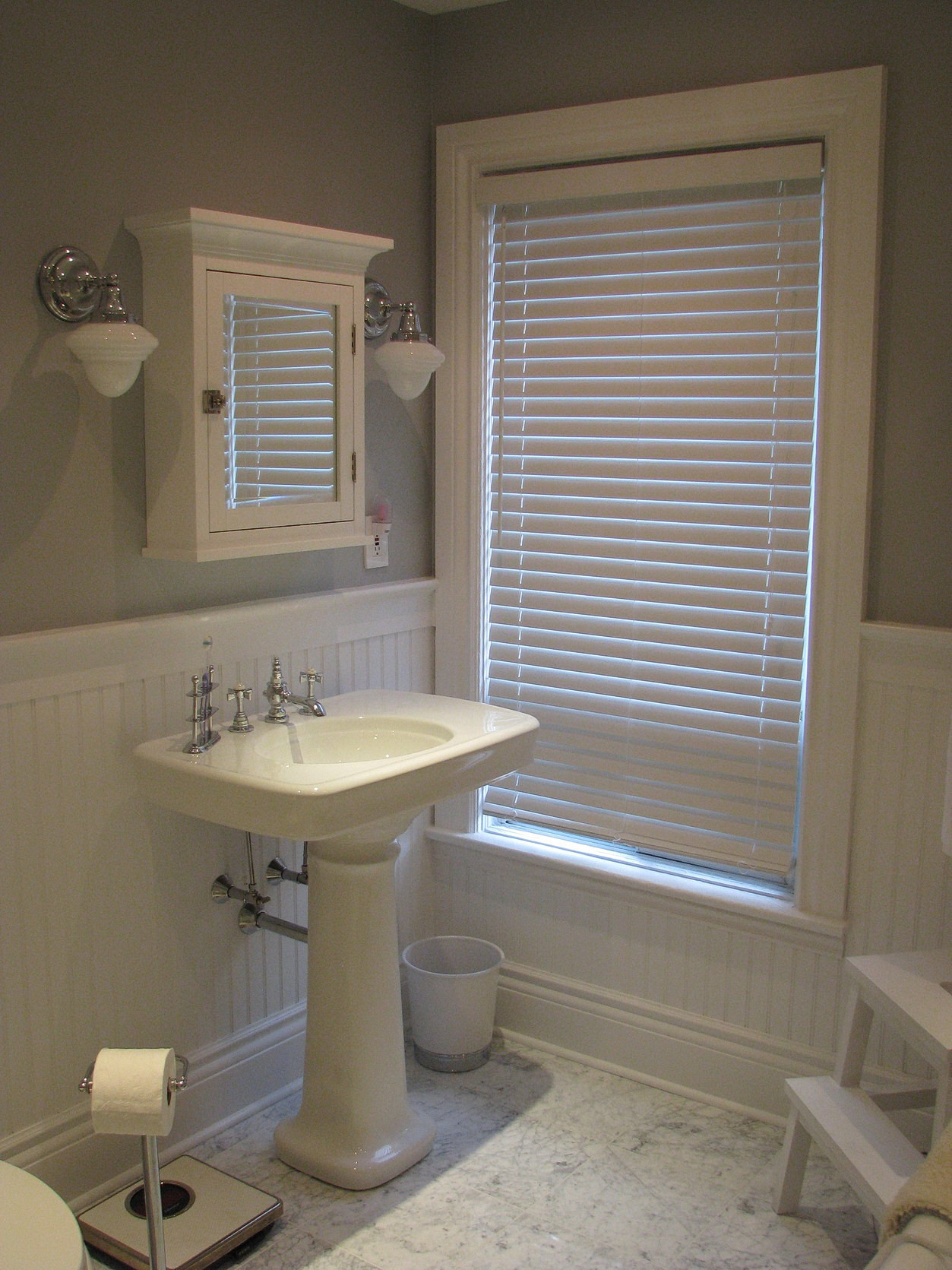 Cover Bathroom Tile
 How to Cover Dated Bathroom Tile with Wainscoting
