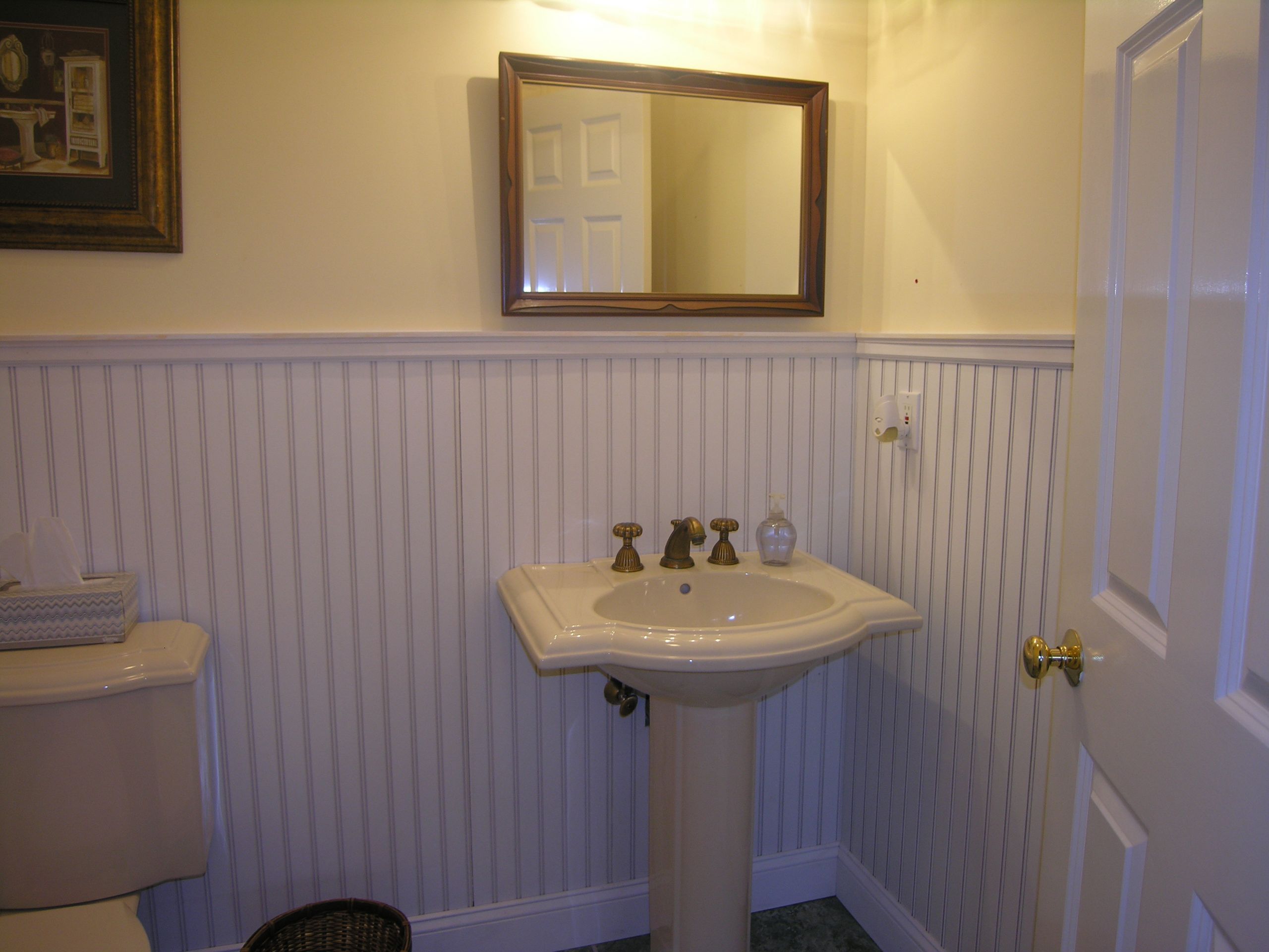 Cover Bathroom Tile
 Covering a tile wall with a beadboard wainscot