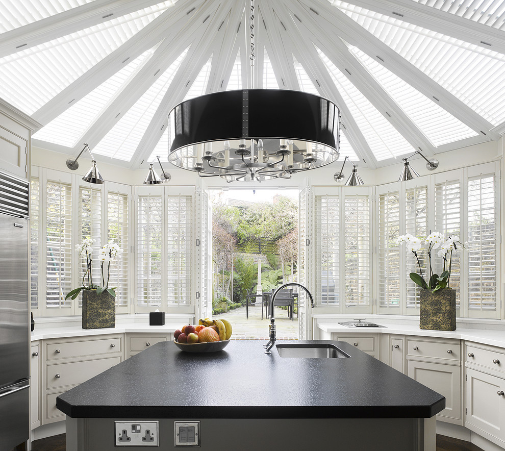 French Country Kitchen Pendant Lighting
 Elegant puck lights in Kitchen Contemporary with