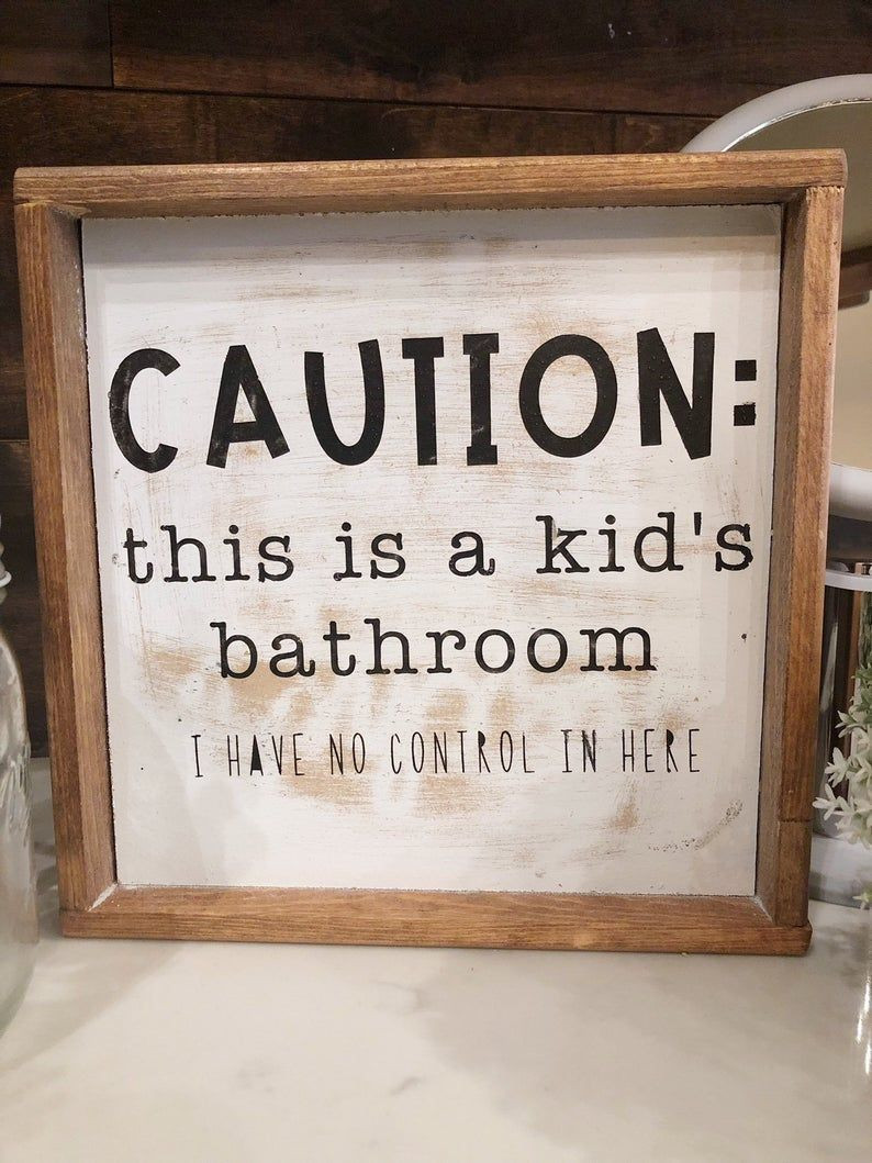 Kids Bathroom Sign
 Caution this is a kid bathroom funny bathroom sign
