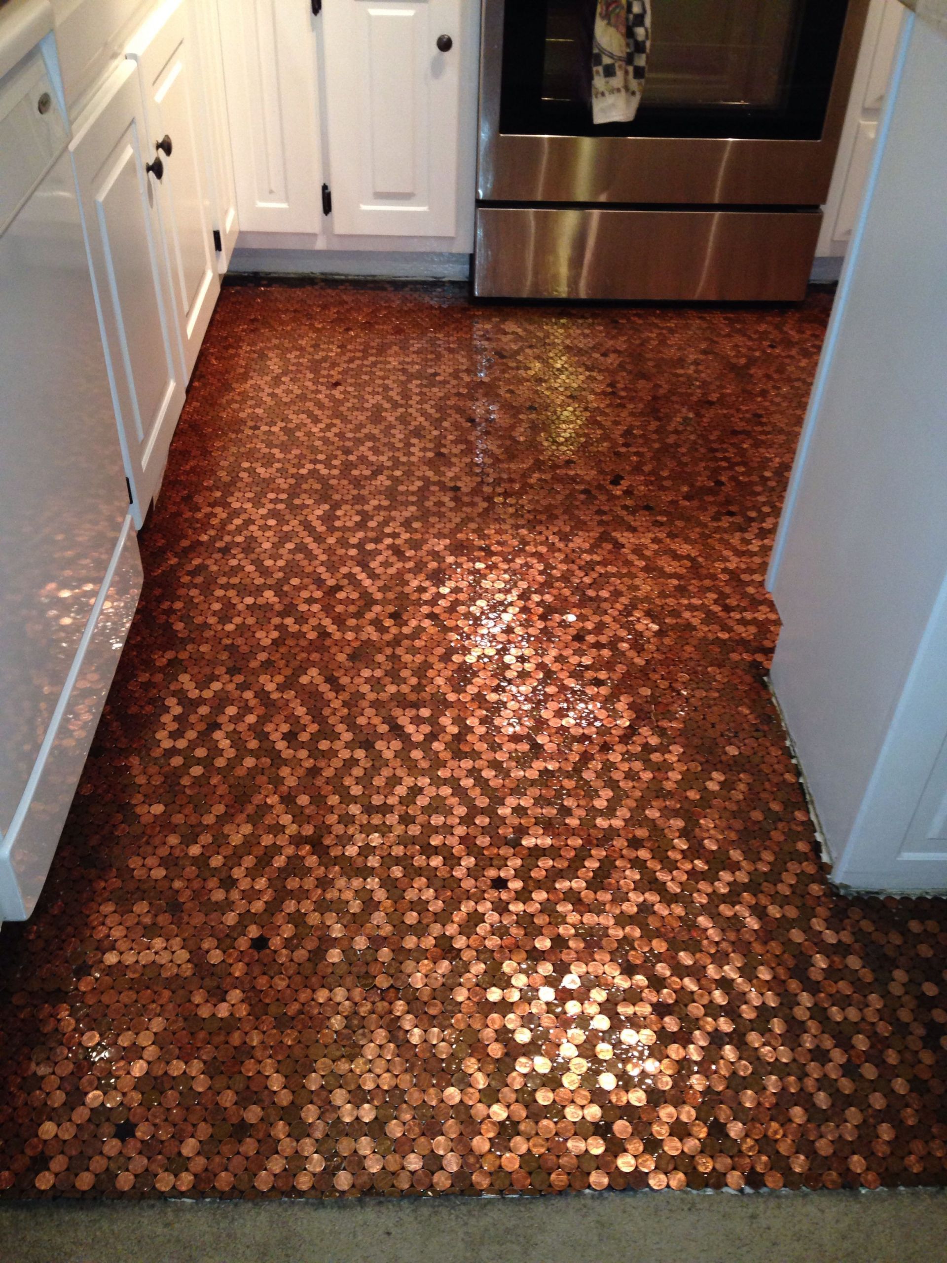 Kitchen Floor Made Of Pennies
 My penny floor