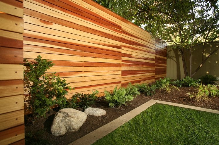 Landscape Timber Fence
 Backyard Fencing Ideas Landscaping Network