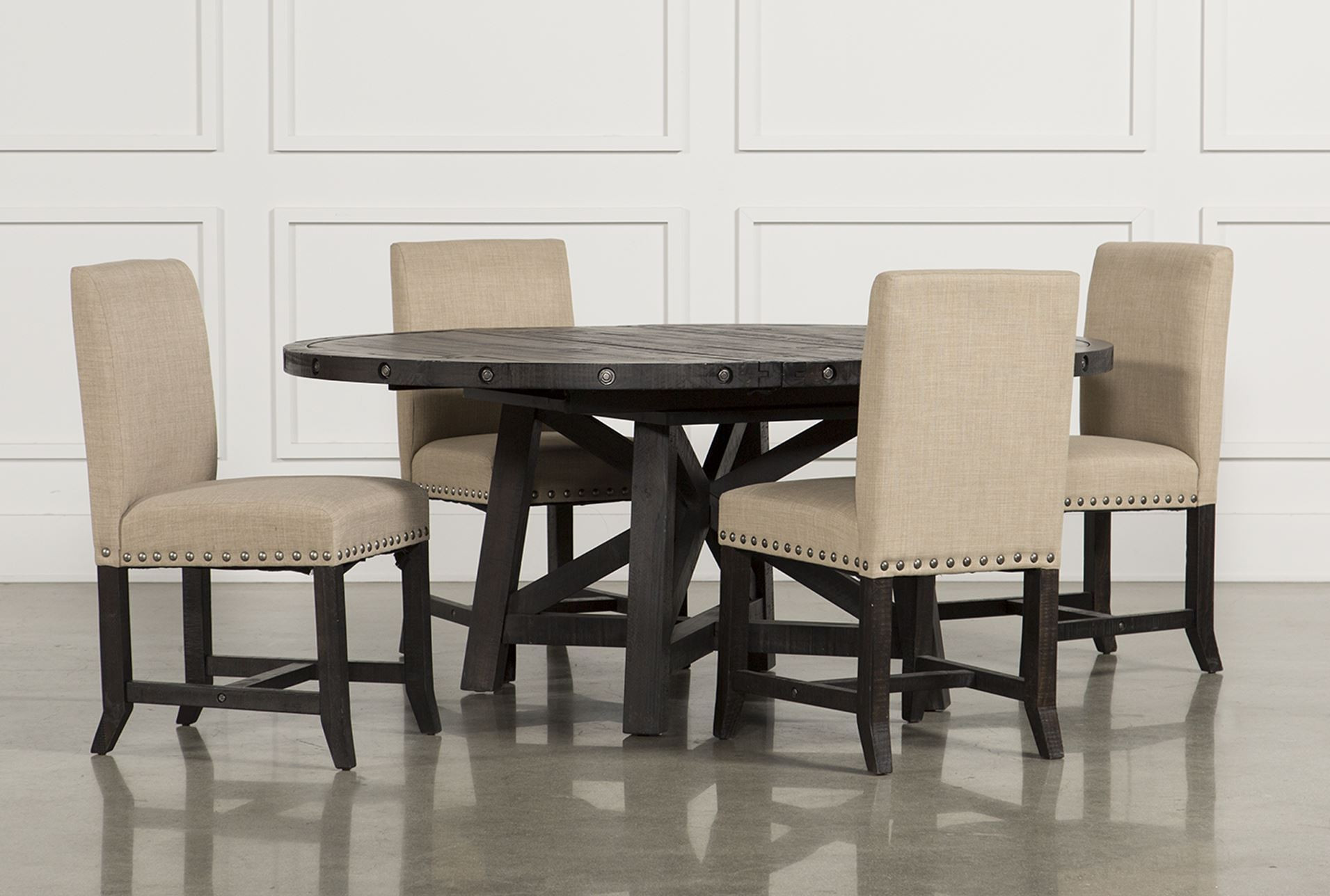 Living Spaces Dining Table
 Jaxon 5 Piece Round Dining Set W Upholstered Chairs