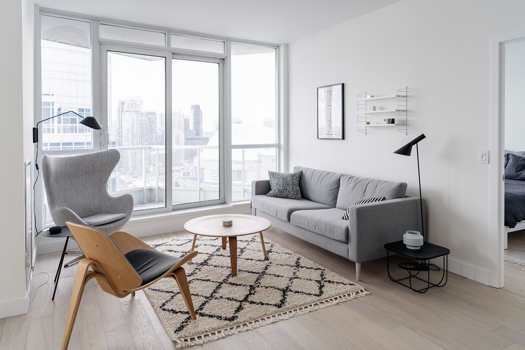 Minimalist Living Room
 Condo living room tour a bright minimalist space