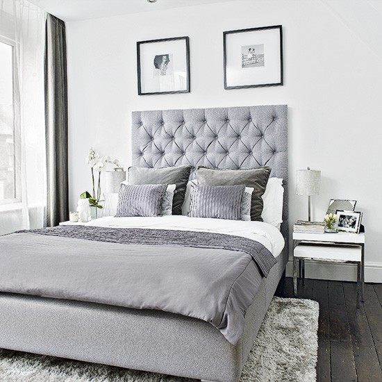 Modern Grey Bedroom
 Modern bedroom with grey upholstered bed and soft