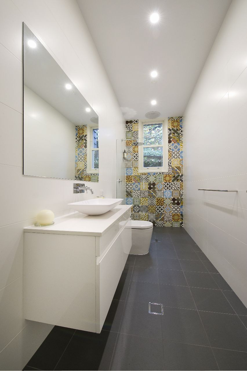 Narrow Bathroom Mirror
 Long narrow bathroom with tiled feature wall around the