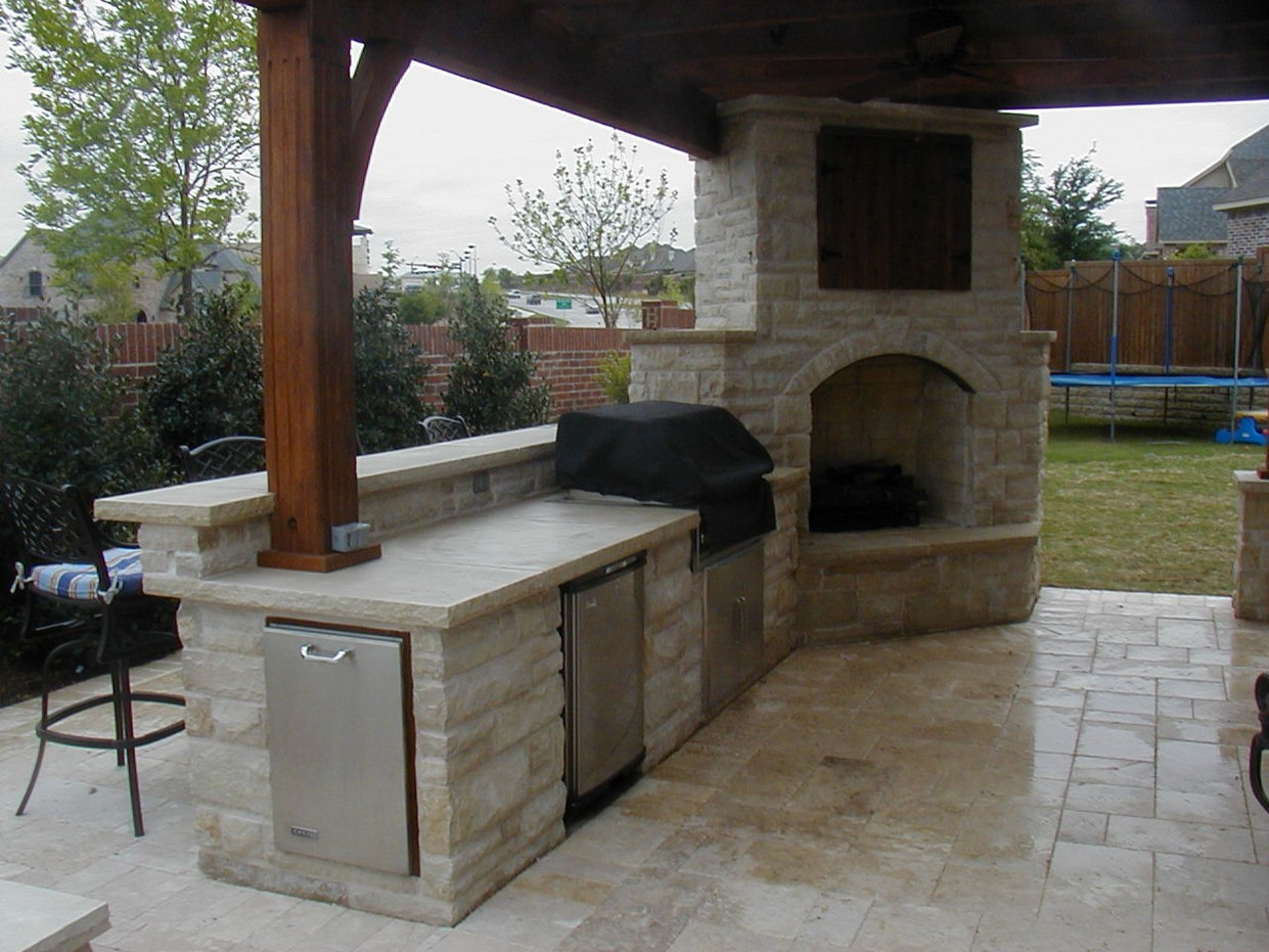 Outdoor Kitchen Fireplace
 Interior Corner Kitchen with Corner Range and Fireplace