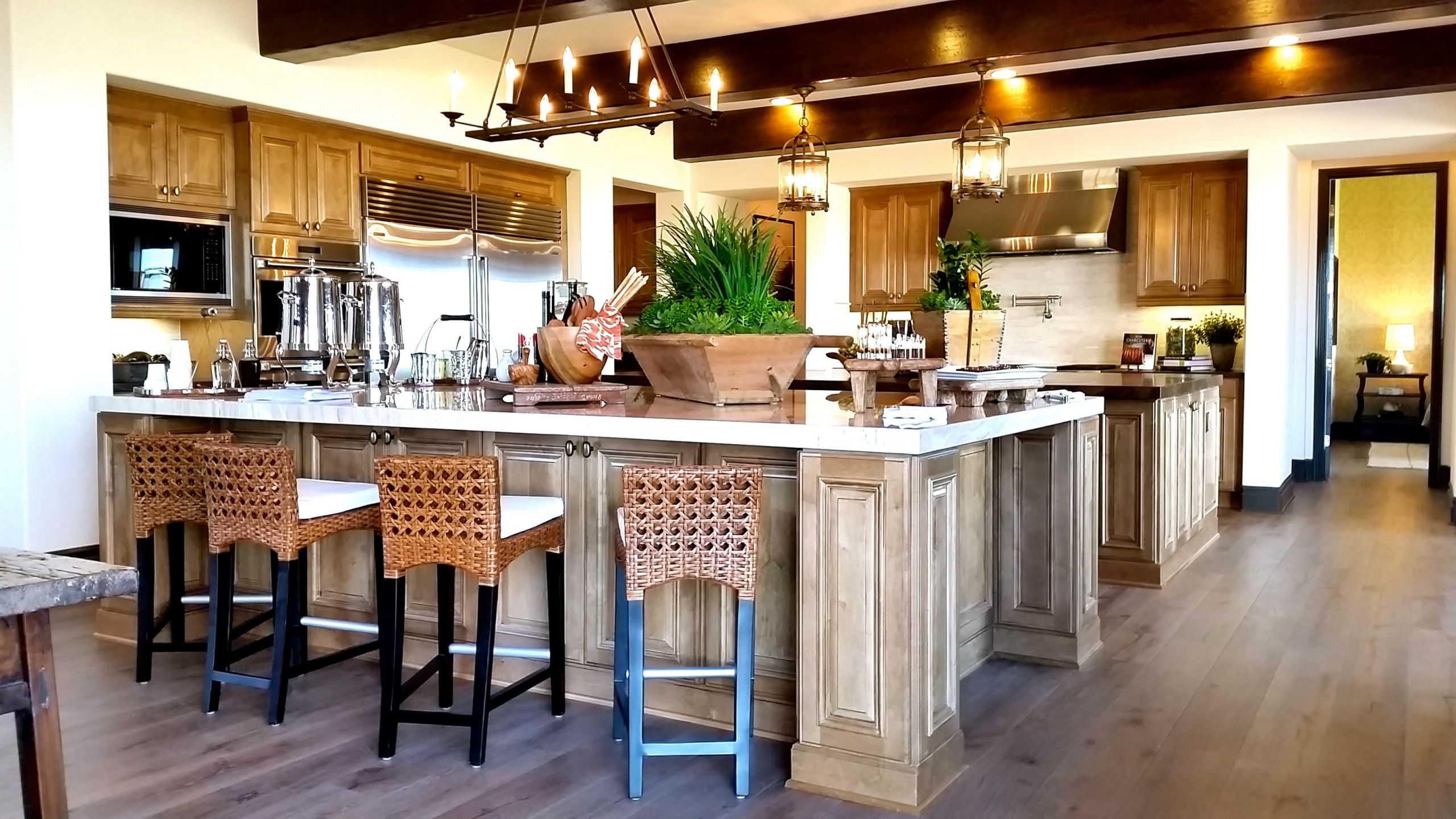 Rustic Kitchen Island With Seating
 Charming rustic wooden accents on this large kitchen