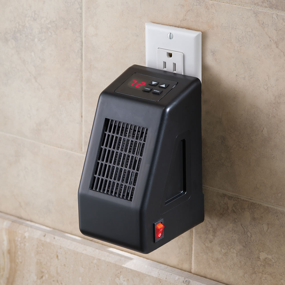 Small Heater For Bathroom
 The Wall Outlet Space Heater Hammacher Schlemmer