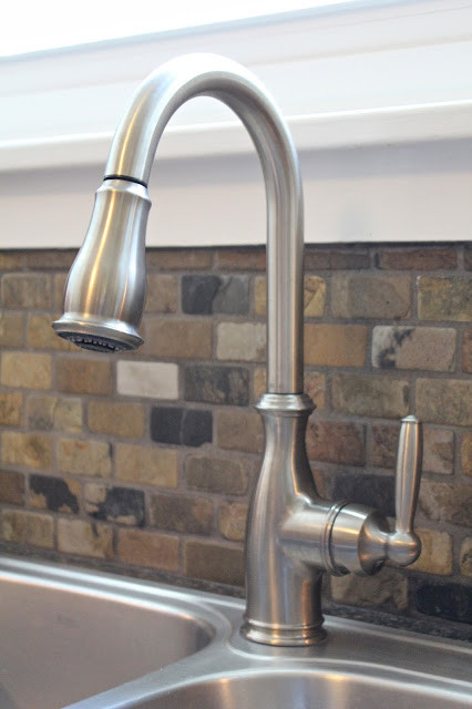 Small Kitchen Faucet
 Small Kitchen Remodel Featuring Slate Tile Backsplash