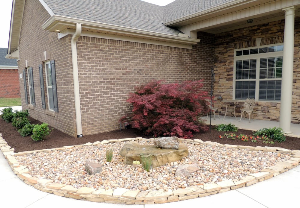 Stacked Stone Landscape Edging
 New landscape with bubbler shrubs stacked stone edging