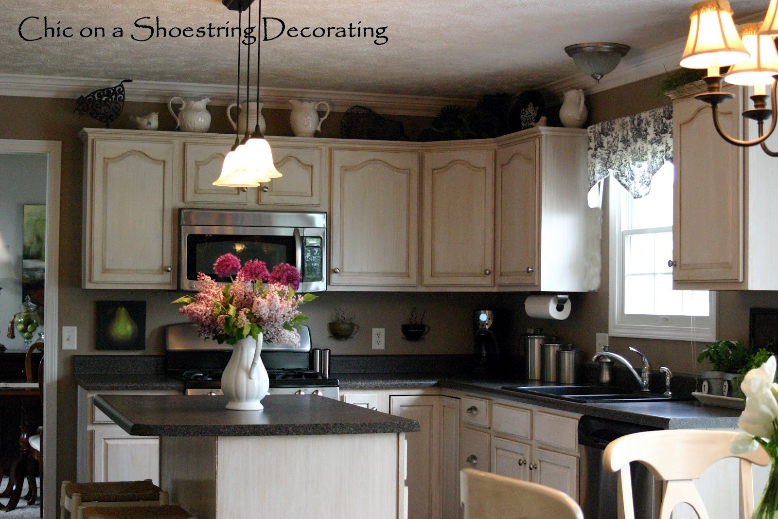 Top Of Kitchen Cabinet Decorations
 Chic on a Shoestring Decorating My Spring Kitchen