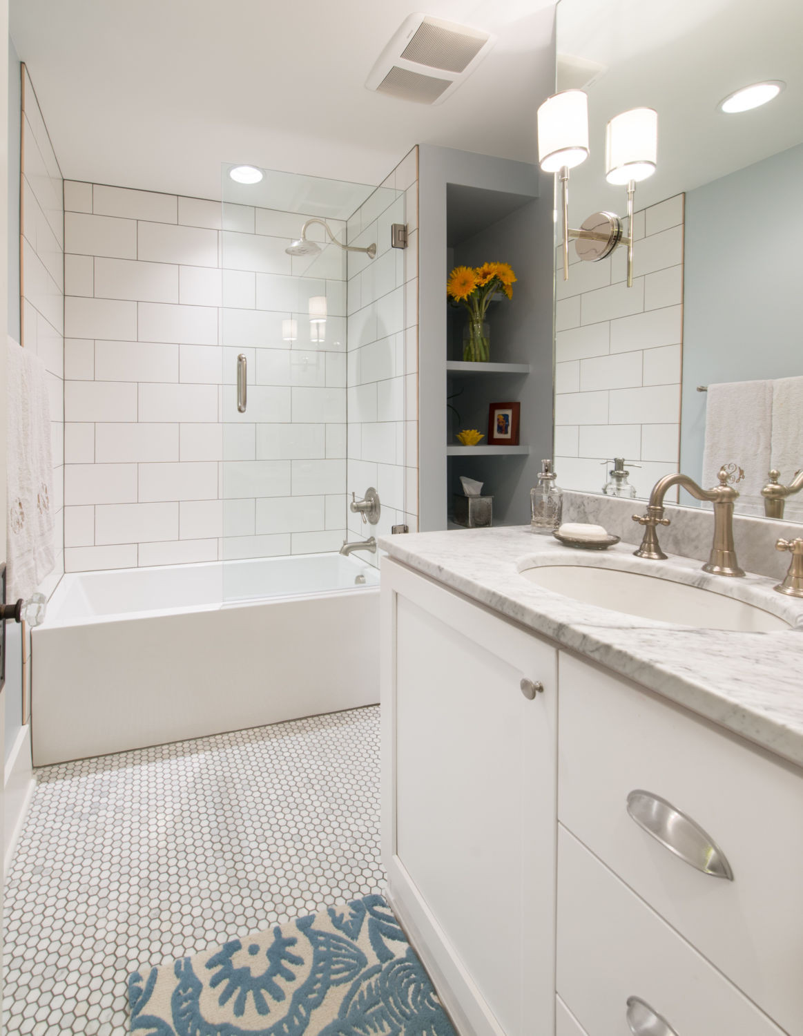 White Bathroom Tiles
 6 Tips to Remodeling a Busy Bathroom by HighCraft Builders