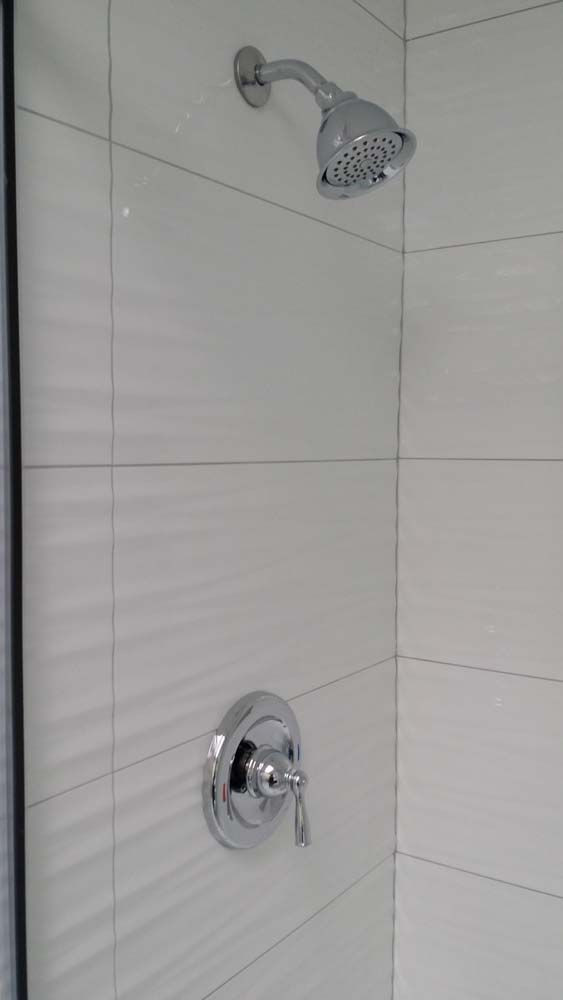 White Tile Bathroom Shower
 Wavy white tiles in shower grey grout
