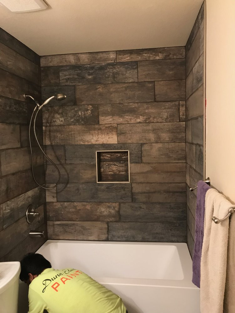 Wood Tiled Bathroom
 Im loving the wood themed shower tile shower wall Yelp